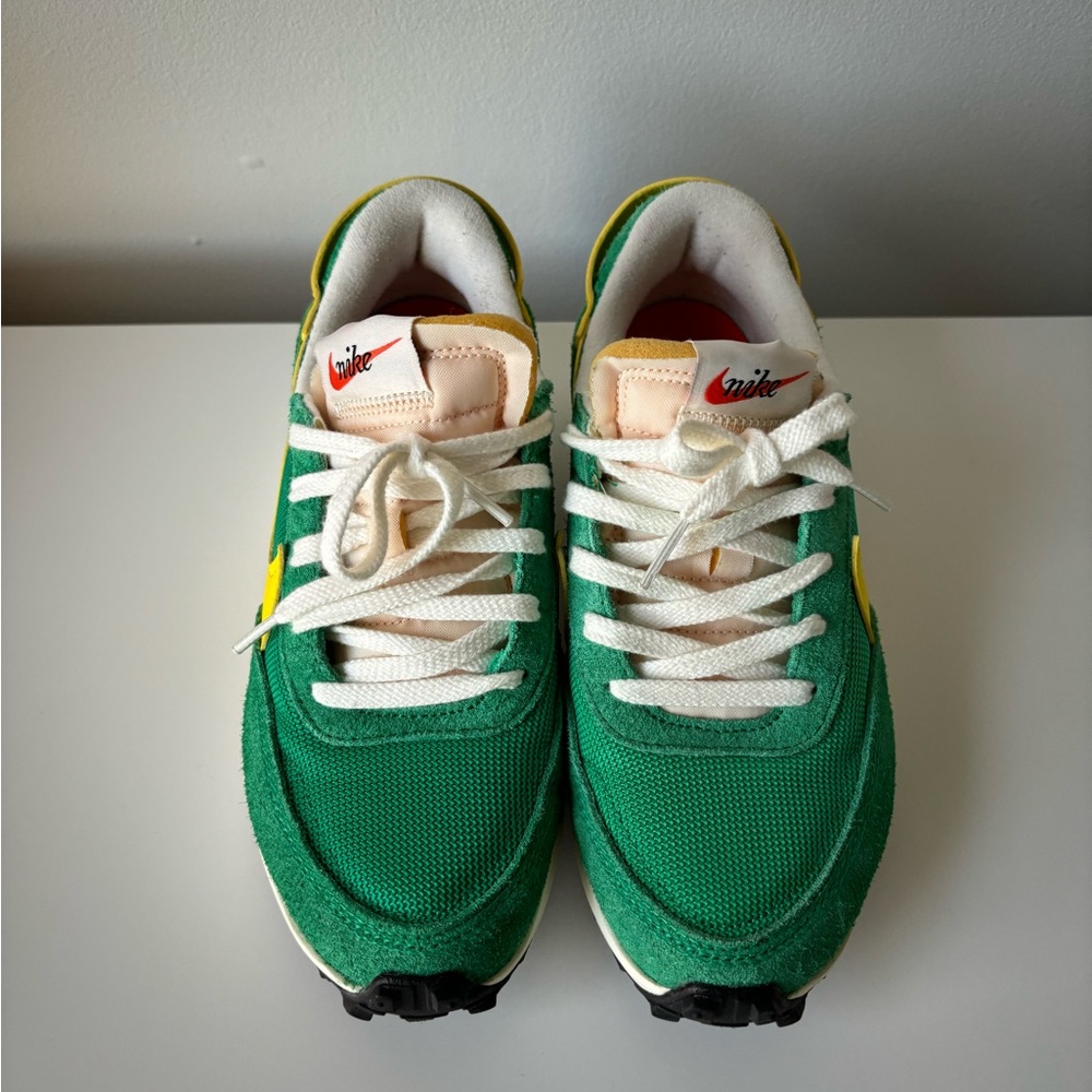Green and yellow Nikes (size 7)